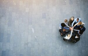 people gathering around forming a circle